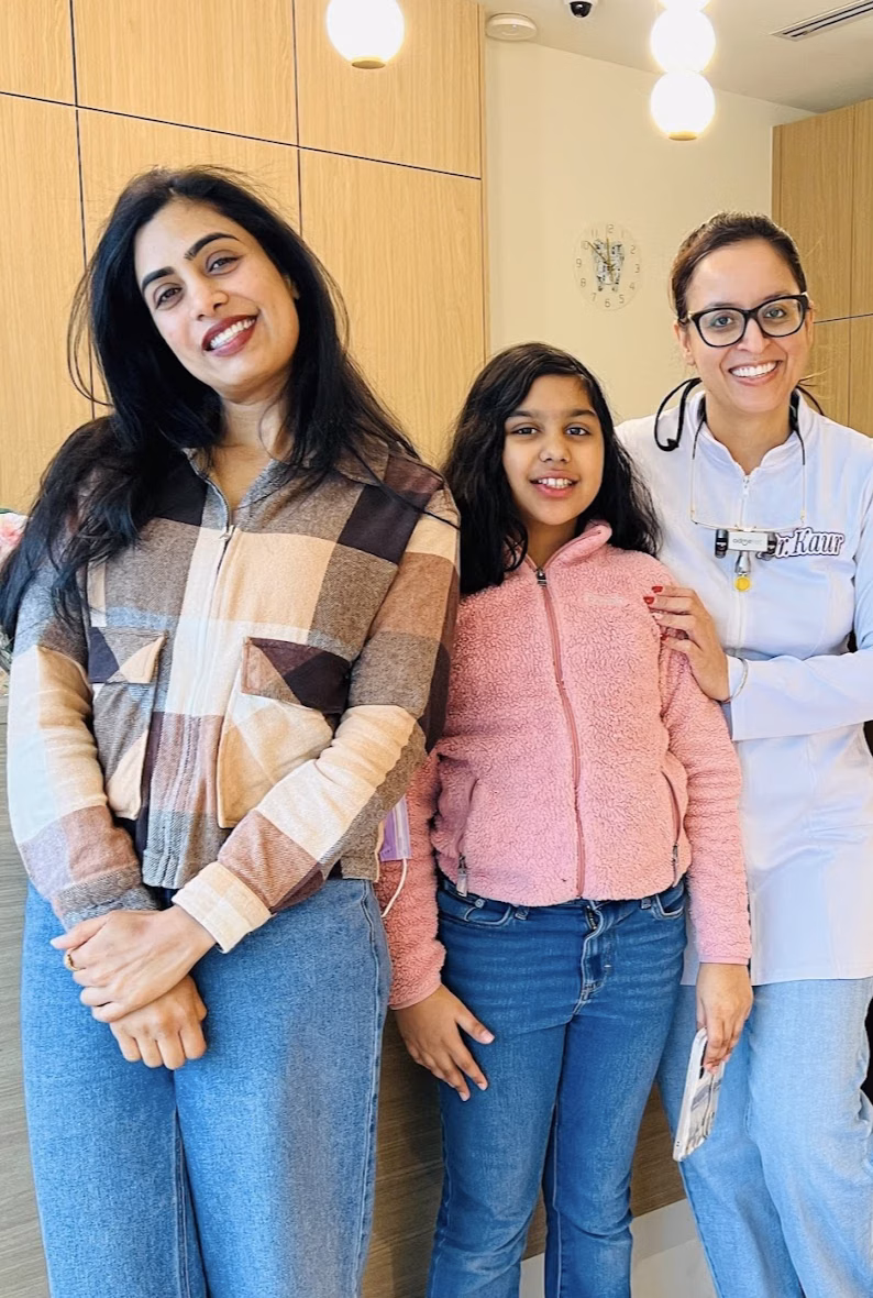 P C with the Dazzle Dental team